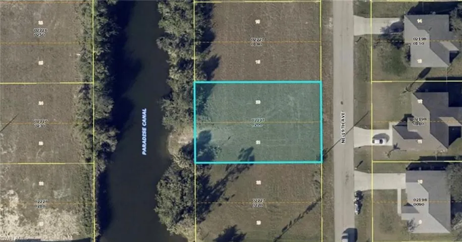 Aerial map of property and surrounding area with property boundaries highlighted
