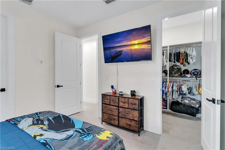 Bedroom with a closet and visible vents