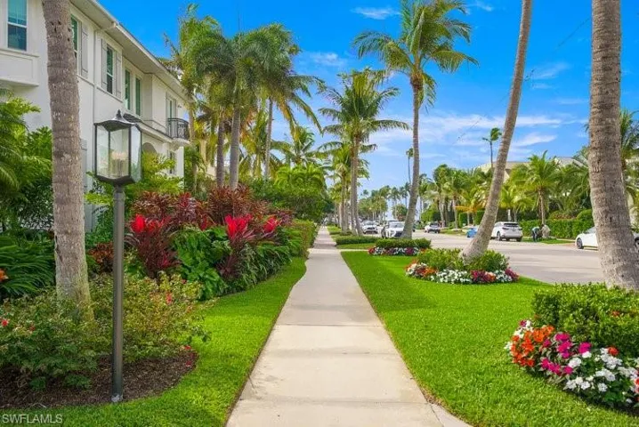 View of community with a yard