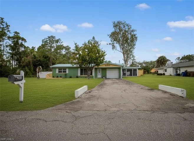 1313  Cleveland  AVE, Lehigh Acres, FL 33972