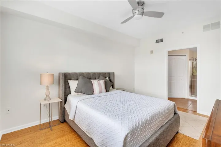 Bedroom featuring light wood-type flooring and ceiling fan