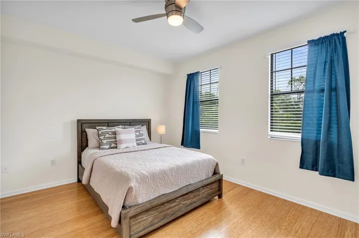 Bedroom featuring light wood-type flooring and ceiling fan