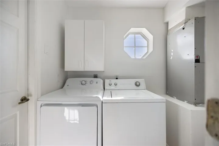 A convenient Laundry Room tucked away next to the Garage
