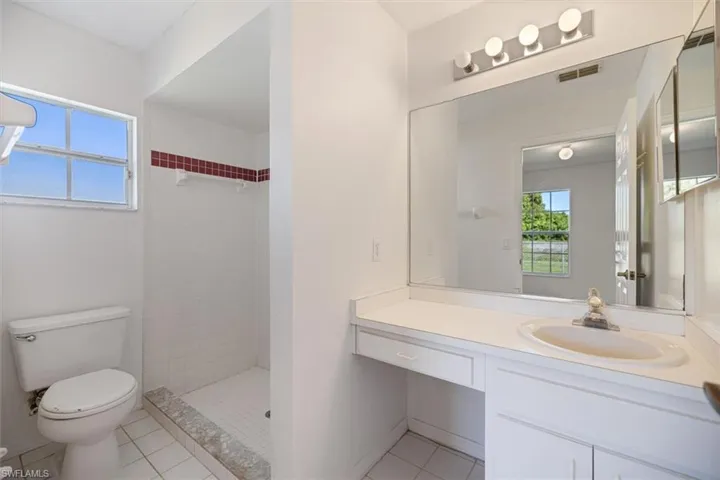 An easy access stand-up shower for the utmost in safety & convenience