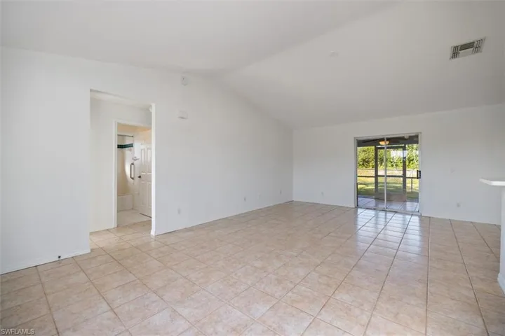 Convenient access to the outdoor screened lanai from the living room