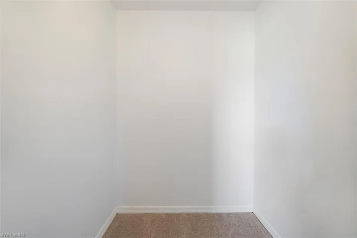 This impressive walk-in closet is 5.50' x 5.50' square