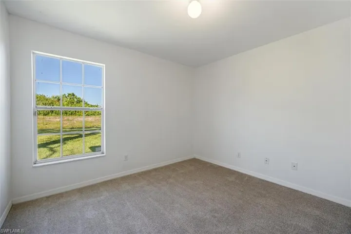 The other guest bedroom
