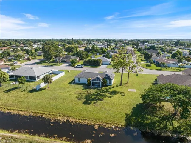 The backyard edges up to the canal, which means no neighbors in the back