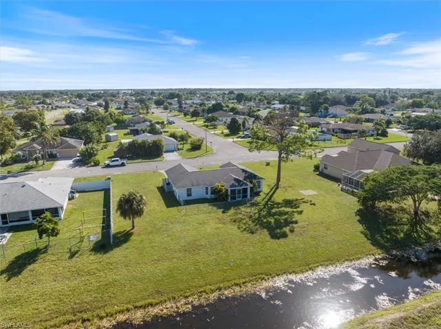 The backyard edges up to the canal, which means no neighbors in the back