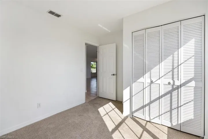 The other guest bedroom