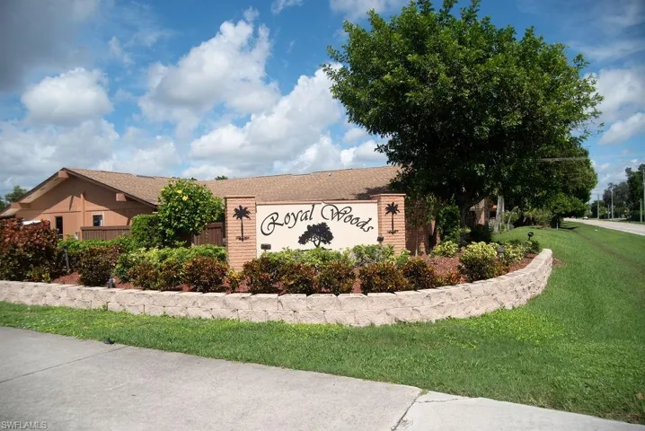 Community sign with a lawn