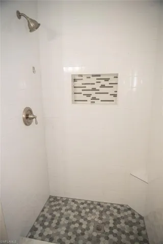 Bathroom with tiled shower