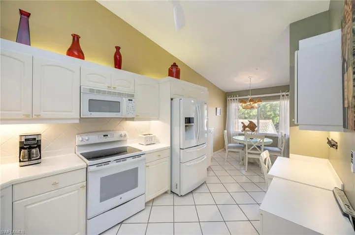 Extra upper cabinets above the built-in desk