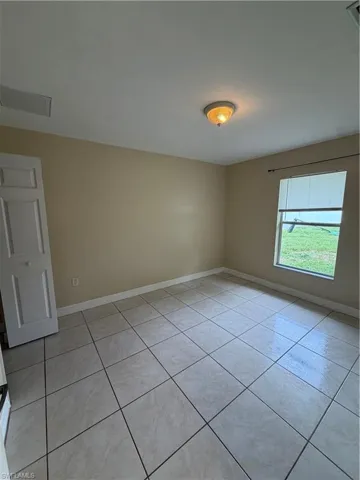 409 Candlewick Cir E, Lehigh Acres, Florida 33936