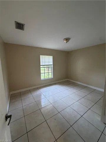 409 Candlewick Cir E, Lehigh Acres, Florida 33936