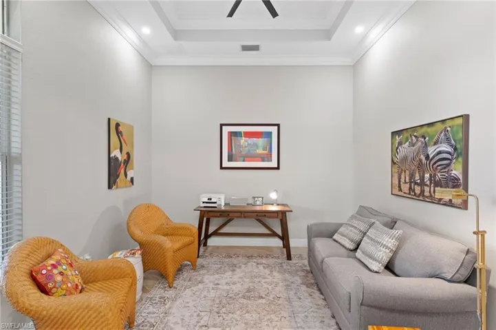 Tray ceiling, recessed lighting, and ceiling fan