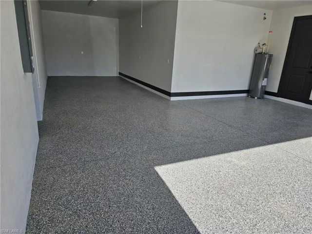 Spare room featuring water heater