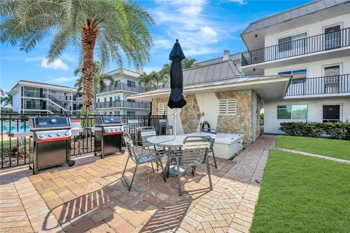 View of patio / terrace with area for grilling and outdoor dining area