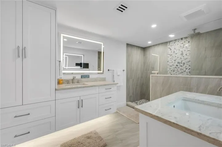 All New Primary Bath with Two Vanities, Walk In Shower, Tile walls, Smart Mirrors