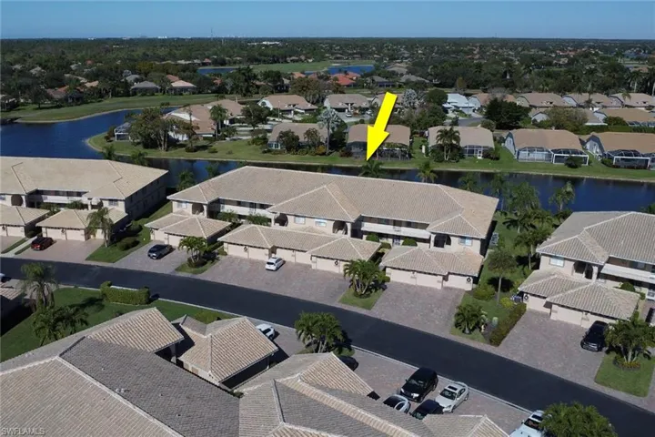 Aerial view of residential area with a nearby body of water