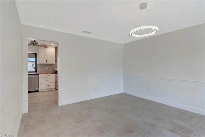 Formal Dining room with crown molding
