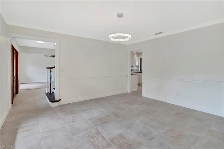 Formal Dining room with crown molding