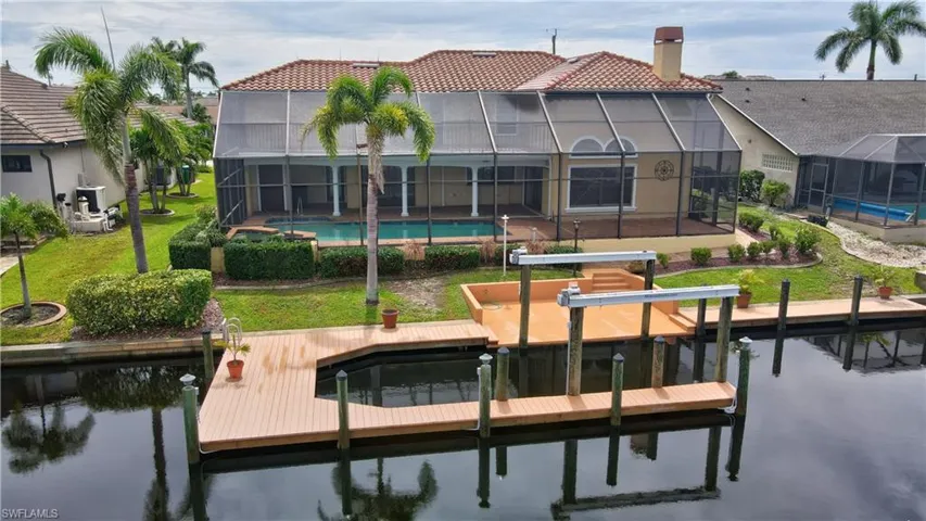 View of dock with a 65 ft dock with 14,000lb lift