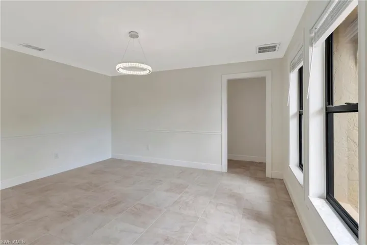 Formal Dining room with crown molding