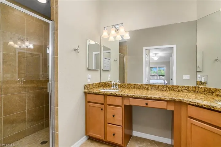 Owner's suite features an en suite bathroom, with dual sinks and a walk in shower.