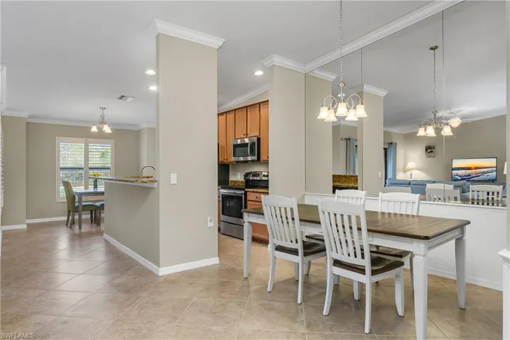Dining room is located right off of kitchen making entertaining dinner guests a breeze.