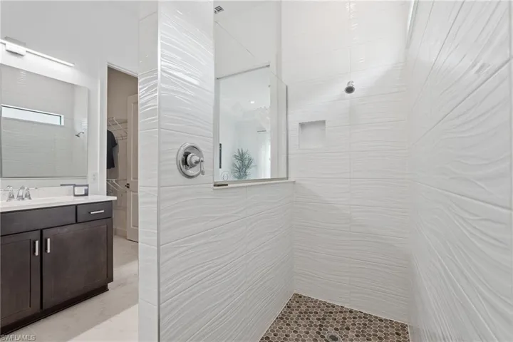 Extended Large Walk-in Shower w/10x28 Wavy Tile