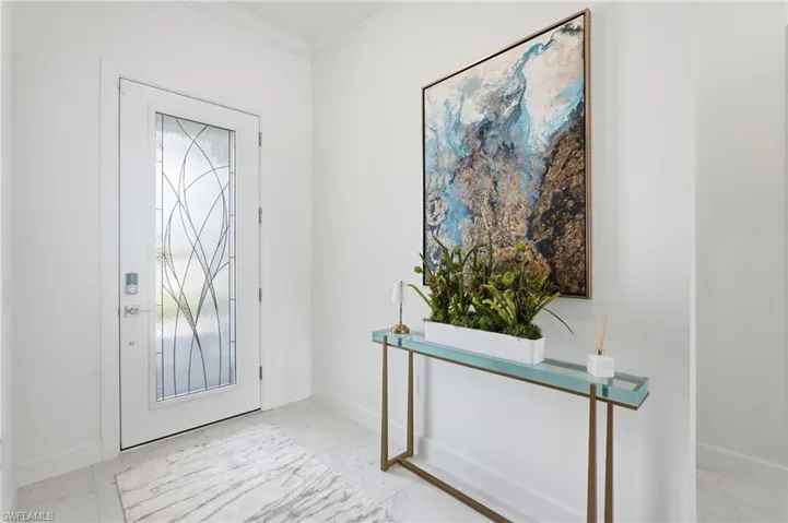 Bright Entry Foyer and Impact Front Door