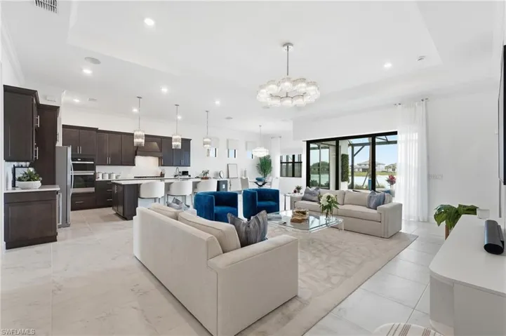 Open Floor-plan and flow into kitchen, dining and outdoor area