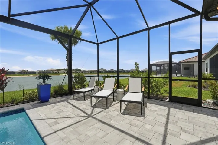 Spacious Pool deck with outdoor lounging and sun deck