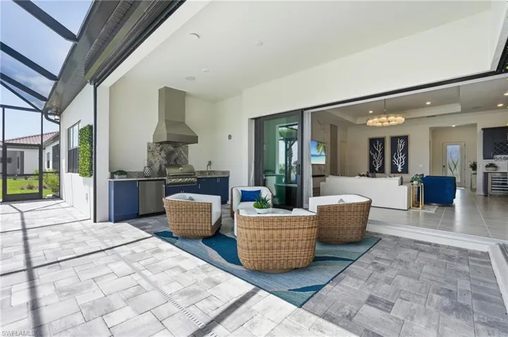 Newly Installed Outdoor Kitchen- Outdoor Cabinetry BBQ Grill & Vented Hood, SS Refrigerator and Sink