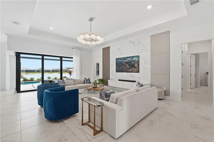 Living Room with Dropped Ceiling, Custom Tv Wall and Views to Outdoor Oasis