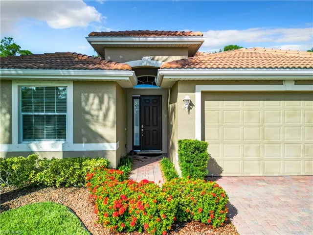 Property entrance featuring a garage