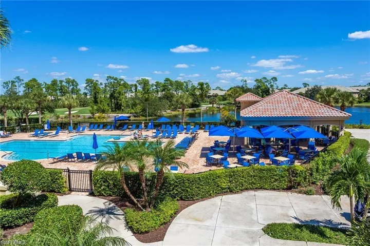 View of pool featuring a water view and a patio