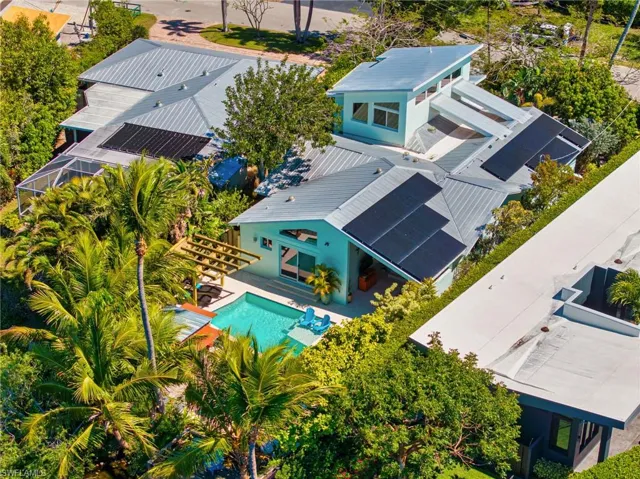 View from above of property featuring a pool