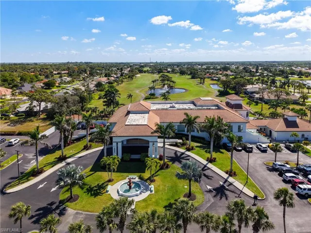 Aerial view featuring a residential view and golf course view