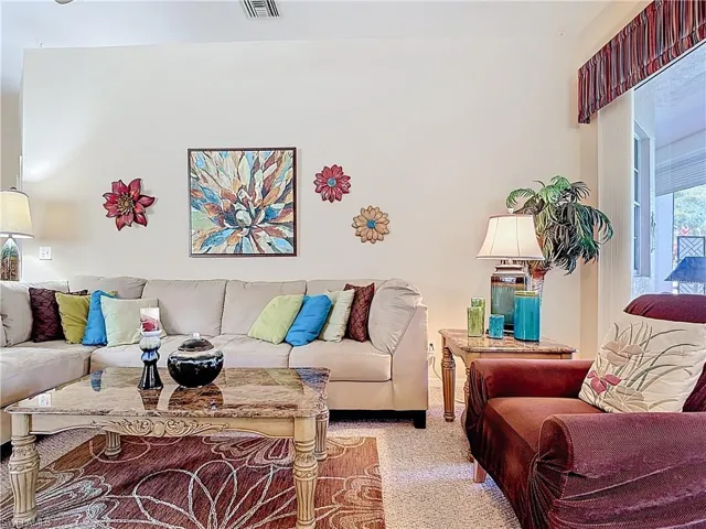 Living room with carpet floors
