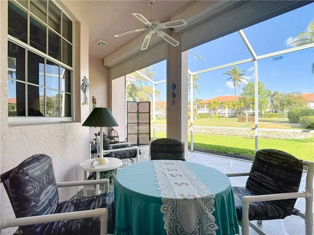 Sunroom / solarium featuring a ceiling fan, visible vents, and a wealth of natural light