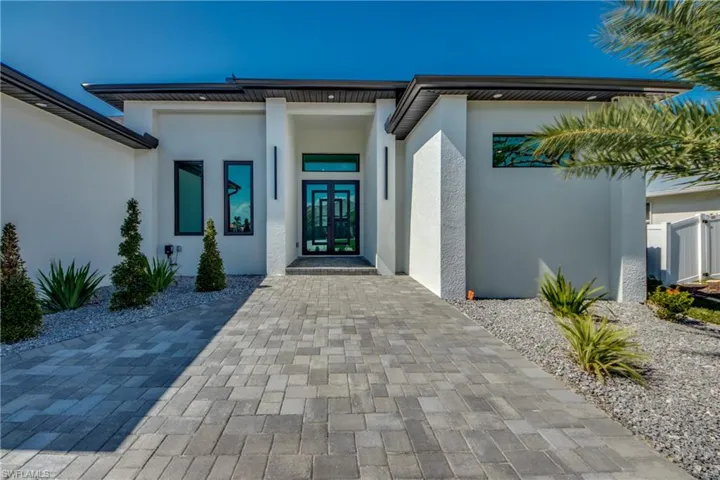 Property entrance with french doors