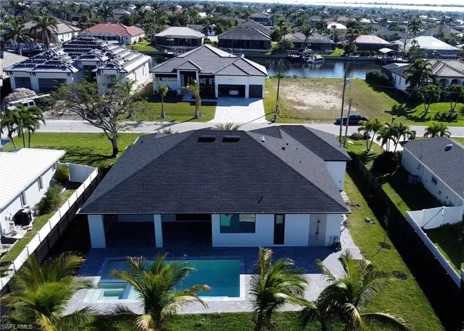 Bird's eye view featuring a water view and a residential view