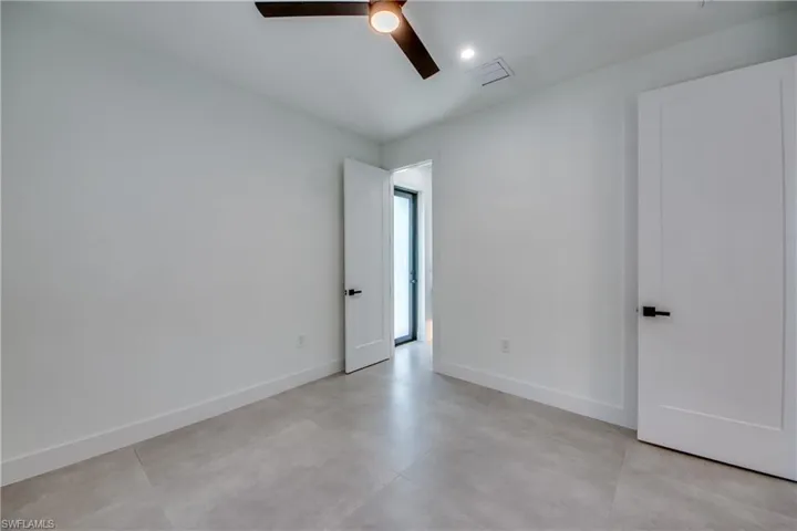 Spare room featuring ceiling fan