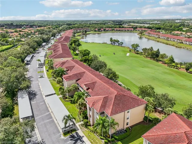 Aerial view of a golf course and a large body of water