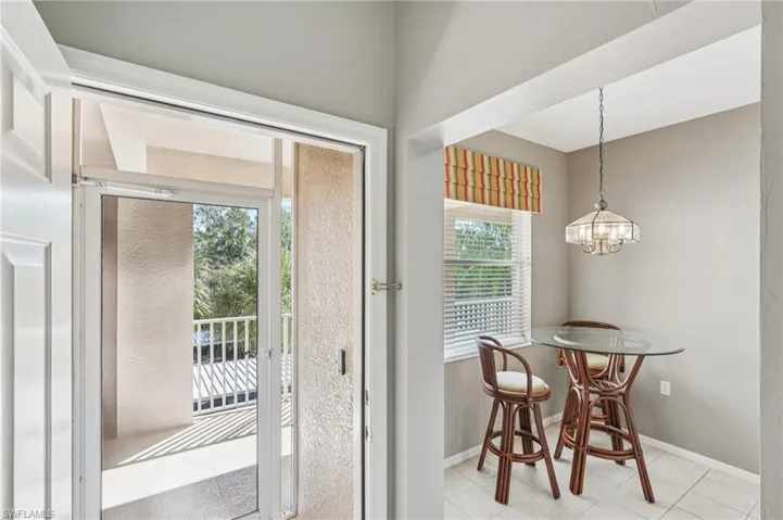 Entryway featuring tile patterned floors and baseboards
