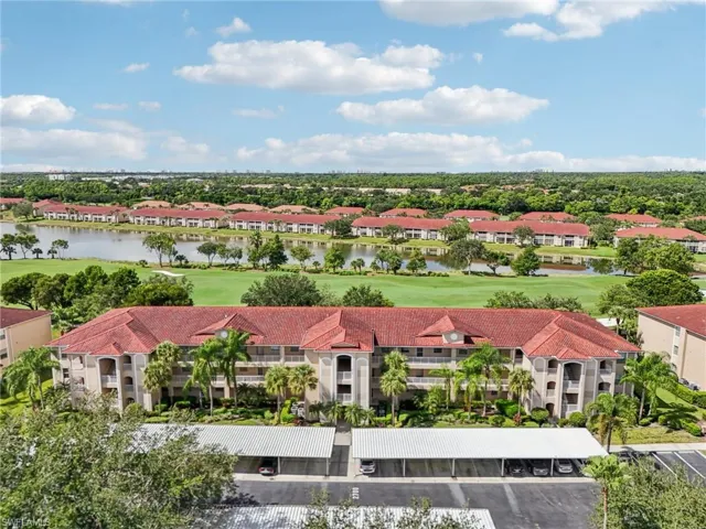 Bird's eye view of apartment complex and a local golf course