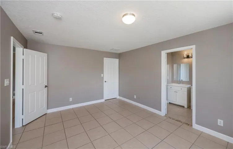 View of tiled spare room