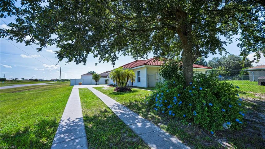 View of front of property featuring a front lawn